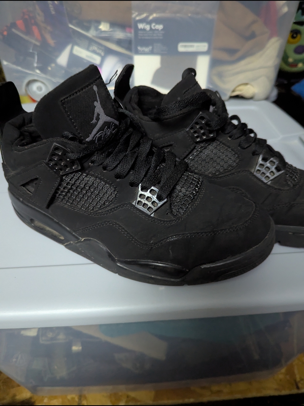 Jordan Men’s Black Air Jordan 4 Retro Sneakers